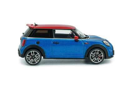 Side profile of Mini Cooper John Cooper Works Island Blue Metallic 2023 1:43 scale model car by Solido with machined multi-spoke JCW alloys (S4315003)