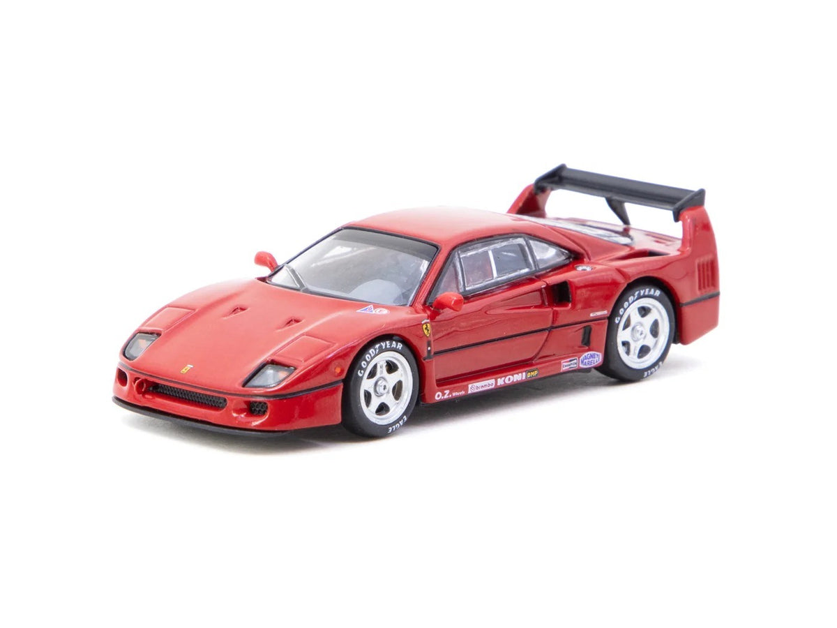 Front three-quarter view of Ferrari F40 red 1:64 diecast model car by Tarmac Works showing the race decals and white OZ wheels (T64R-076-RE2)