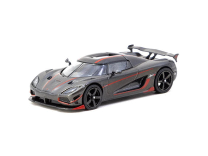 Front three-quarter view of Koenigsegg Agera RS black carbon fibre 1:64 diecast model car by Tarmac Works with red accent stripes (T64G-TL005-BCF)