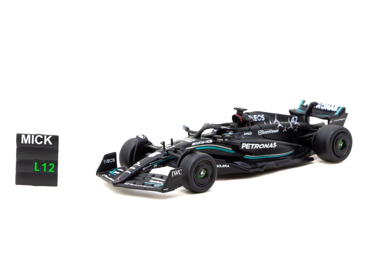 Front three-quarter view of Mercedes-AMG F1 W14 Mick Schumacher number 47 1:64 diecast by Tarmac Works with the MICK pit board accessory (T64G-F064-MS1)