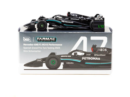 Mercedes-AMG F1 W14 Mick Schumacher 1:64 scale model car in its Tarmac Works x iXO Spanish Grand Prix tyre testing display packaging (T64G-F064-MS1)