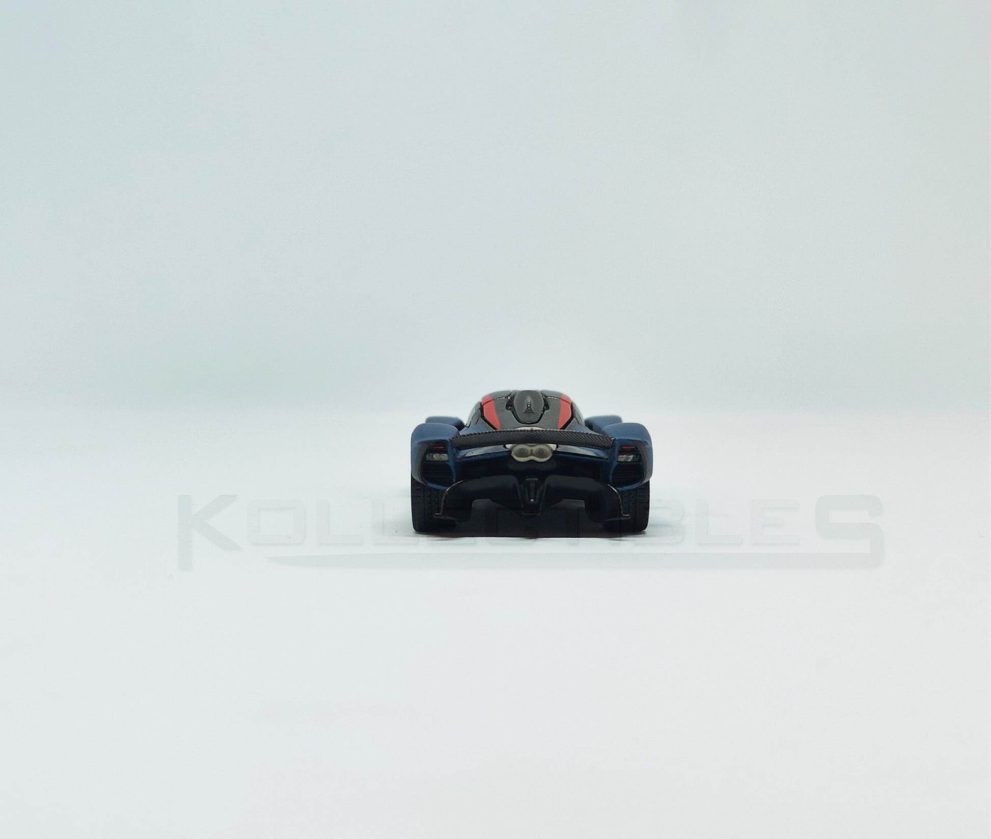  Back view of Aston Martin Valkyire Satin Marina Blue 1:64 scale model car- Xcartoys x Poprace
